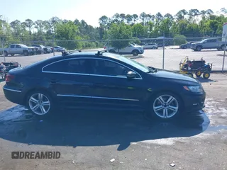 2016 Volkswagen CC Sport z VIN WVWBP7AN7GE505263, wystawiony jako IAAI lot #42190444 z przebiegiem 102 081 mil mil oraz . Historia ofert i sprzedaży dostępna na DreamBid. Obrazek 13.