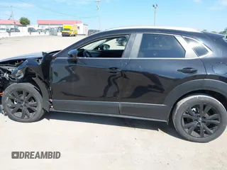 2022 Mazda CX-30 2.5 Turbo with VIN 3MVDMBAY4NM452705, listed as a IAAI auction lot 40101452 with 18,873 mi miles and . Bid and sale history available at DreamBid. Image 14.