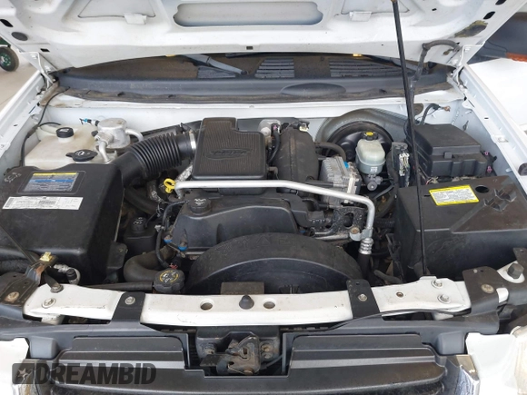 2003 GMC Envoy SLE with VIN 1GKDT13SX32319740, listed as a IAAI auction lot 41923578 with 210,811 mi miles. Bid and sale history available at carsss.com. Image 10.