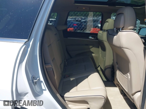 2015 Jeep Grand Cherokee Overland with VIN 1C4RJECG6FC707458, listed as a IAAI auction lot 41996350 with 128,307 mi miles and . Bid and sale history available at DreamBid. Image 8.