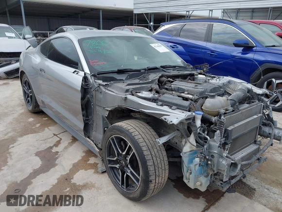2020 Ford Mustang EcoBoost with VIN 1FA6P8TH9L5139174, listed as a IAAI auction lot 42148089 with 115,979 mi miles and . Bid and sale history available at DreamBid. Image 1.
