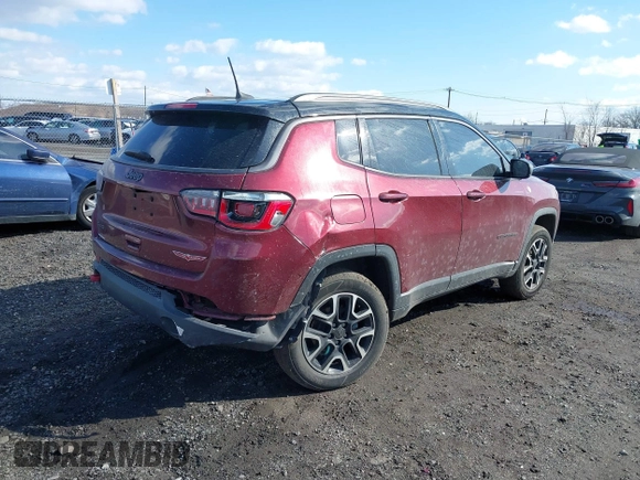 2020 Jeep Compass Trailhawk with VIN 3C4NJDDB2LT239384, listed as a IAAI auction lot 41527372 with 56,122 mi miles and . Bid and sale history available at carsss.com. Image 4.