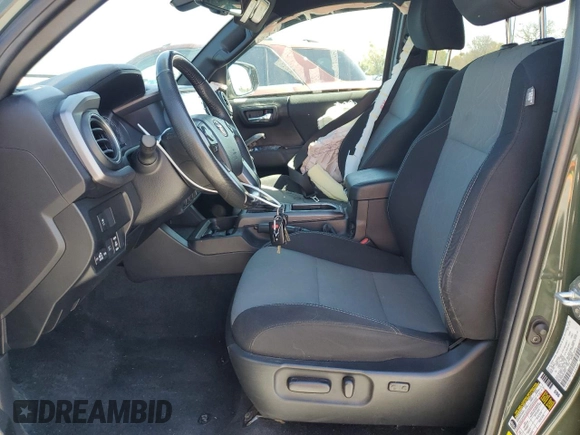 2022 Toyota Tacoma SR z VIN 3TMCZ5AN6NM479653, wystawiony jako Copart lot #47704285 z przebiegiem 57 618 mil mil oraz Szkoda całkowita • Salvage title. Historia ofert i sprzedaży dostępna na DreamBid. Obrazek 7.