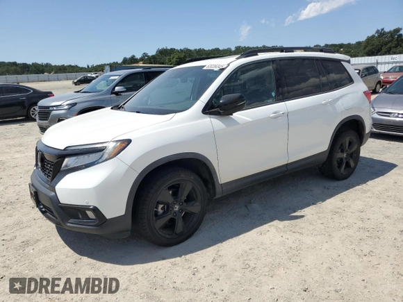 2021 Honda Passport Elite with VIN 5FNYF8H03MB007617, listed as a Copart auction lot 63036345 with 21,757 mi miles and Salvage title. Bid and sale history available at DreamBid. Image 1.