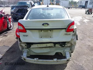 2013 Ford Fiesta S z VIN 3FADP4AJ9DM191664, wystawiony jako IAAI lot #41827196 z przebiegiem 111 982 mil mil oraz . Historia ofert i sprzedaży dostępna na DreamBid. Obrazek 6.