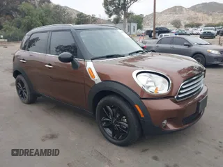 2013 MINI Cooper Countryman with VIN WMWZB3C56DWM09484, listed as a IAAI auction lot 42039954 with 37,264 mi miles. Bid and sale history available at carsss.com. Image 1.