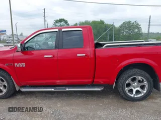 2015 Ram 1500 Laramie z VIN 1C6RR7JM8FS501701, wystawiony jako IAAI lot #42224424 z przebiegiem 59 591 mil mil oraz . Historia ofert i sprzedaży dostępna na DreamBid. Obrazek 14.