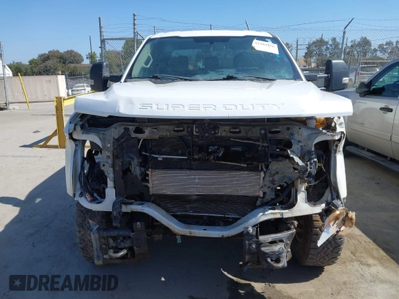 2018 Ford F-250 XL with VIN 1FT7W2B60JEB51984, listed as a IAAI auction lot 42282958 with 76,521 mi miles and . Bid and sale history available at DreamBid. Image 12.