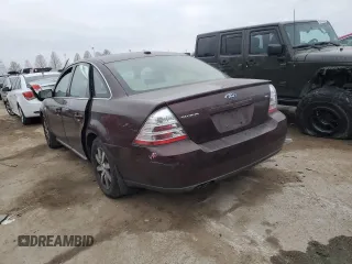 2009 Ford Taurus SEL with VIN 1FAHP24W19G104421, listed as a Copart auction lot 82301983 with 256,008 mi miles and Salvage Title. Bid and sale history available at carsss.com. Image 2.