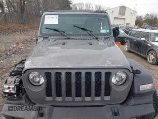 2021 Jeep Wrangler Sport S with VIN 1C4GJXAN9MW768559, listed as a IAAI auction lot 41238254 with 18,191 mi miles and . Bid and sale history available at DreamBid. Image 6.