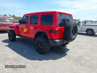 2020 Jeep Wrangler Unlimited Rubicon with VIN 1C4HJXFG9LW106607, listed as a IAAI auction lot 41908295 with 71,083 mi miles and . Bid and sale history available at DreamBid. Image 3.