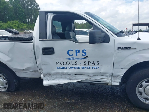 2014 Ford F-150 XL with VIN 1FTMF1CM1EKG31209, listed as a IAAI auction lot 42105573 with 187,162 mi miles and . Bid and sale history available at DreamBid. Image 6.