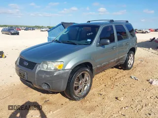 2007 Ford Escape XLS with VIN 1FMCU02ZX7KA92581, listed as a IAAI auction lot 42588917 with 186,699 mi miles and . Bid and sale history available at DreamBid. Image 2.