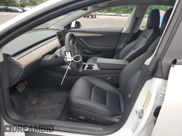 2023 Tesla Model 3 z VIN 5YJ3E1EA3PF574626, wystawiony jako Copart lot #61131145 z przebiegiem 17 390 mil mil oraz Szkoda całkowita • Salvage title. Historia ofert i sprzedaży dostępna na DreamBid. Obrazek 7.