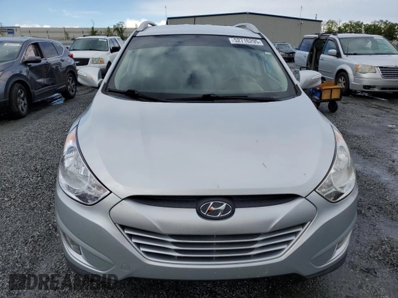 2013 Hyundai Tucson GLS with VIN KM8JU3AC1DU709937, listed as a Copart auction lot 52716295 with 181,711 mi miles and Salvage Title. Bid and sale history available at carsss.com. Image 5.