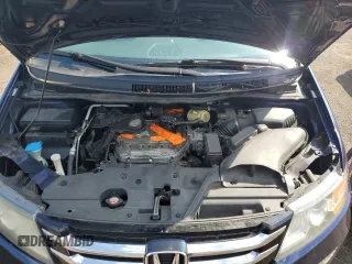 2014 Honda Odyssey LX с VIN 5FNRL5H23EB090464, выставлен на аукционе Copart как лот 59168755 с пробегом 218 131 миль миль и Чистый • Clean title. История ставок и продаж доступна на DreamBid. Изображение 12.