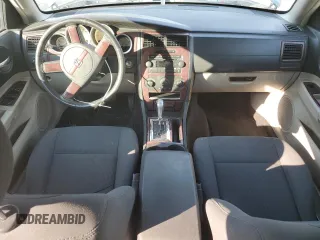 2007 Dodge Charger SXT z VIN 2B3KK43G57H823145, wystawiony jako Copart lot #74926923 z przebiegiem 193 591 mil mil oraz Szkoda całkowita • Salvage title. Historia ofert i sprzedaży dostępna na DreamBid. Obrazek 15.