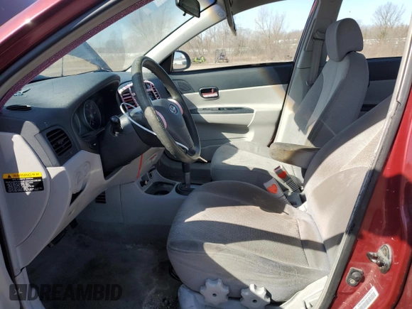 2006 Hyundai Accent GLS with VIN KMHCN46C66U038319, listed as a Copart auction lot 46668495 with 194,499 mi miles and Salvage Title. Bid and sale history available at carsss.com. Image 7.