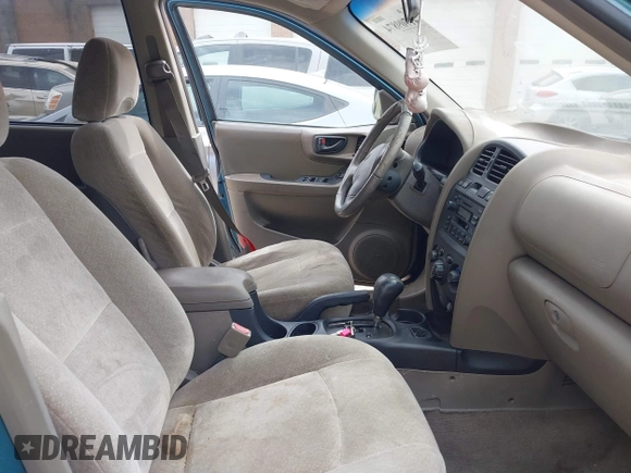 2002 Hyundai Santa Fe GLS z VIN KM8SC13D82U241929, wystawiony jako IAAI lot #41709874 z przebiegiem 153 791 mil mil oraz . Historia ofert i sprzedaży dostępna na DreamBid. Obrazek 5.