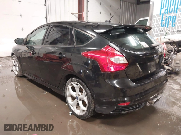 2014 Ford Focus ST with VIN 1FADP3L91EL375674, listed as a IAAI auction lot 41572329 with 100,253 mi miles and . Bid and sale history available at carsss.com. Image 3.