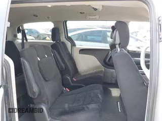 2012 Dodge Grand Caravan SE with VIN 2C4RDGBGXCR360045, listed as a IAAI auction lot 42068008 with 146,907 mi miles and . Bid and sale history available at DreamBid. Image 8.