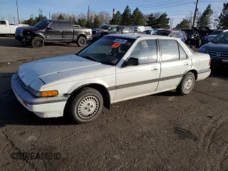 1987 Honda Accord z VIN JHMCA5633HC044303, wystawiony jako Copart lot #85697384 z przebiegiem 19 871 mil mil oraz Nie do naprawy • Non repairable. Historia ofert i sprzedaży dostępna na DreamBid. Obrazek 1.