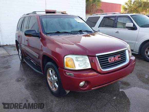 2003 GMC Envoy SLT with VIN 1GKDS13S132118361, listed as a IAAI auction lot 41909425 with 283,342 mi miles. Bid and sale history available at carsss.com. Image 1.