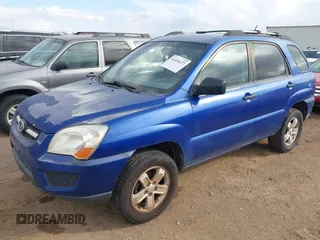 2009 Kia Sportage LX with VIN KNDJF723X97613377, listed as a IAAI auction lot 41454472 with 167,790 mi miles. Bid and sale history available at carsss.com. Image 2.