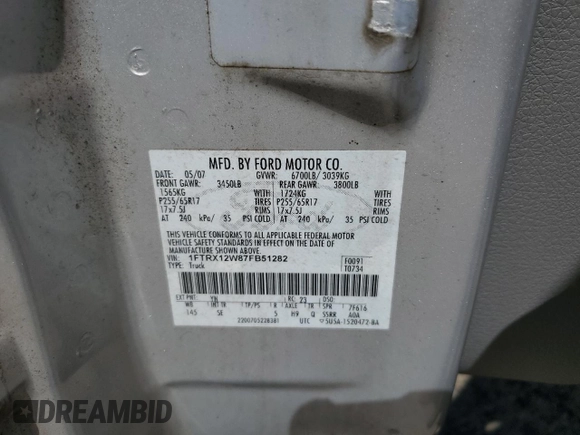 2007 Ford F-150 STX with VIN 1FTRX12W87FB51282, listed as a Copart auction lot 55580365 with 213,923 mi miles and Salvage title. Bid and sale history available at DreamBid. Image 12.