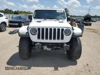 2020 Jeep Wrangler Unlimited Rubicon with VIN 1C4HJXFG3LW184249, listed as a Copart auction lot 56423665 with 63,111 mi miles and Salvage title. Bid and sale history available at DreamBid. Image 5.