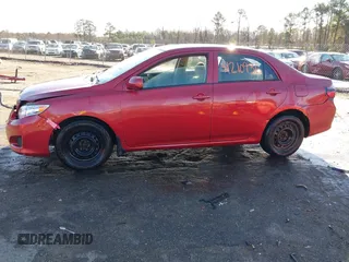 2009 Toyota Corolla with VIN JTDBL40E99J004929, listed as a IAAI auction lot 41210936 with 135,663 mi miles. Bid and sale history available at carsss.com. Image 14.