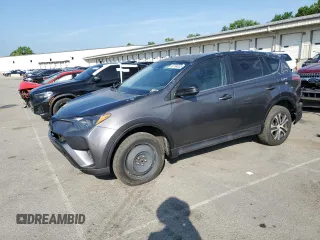 2018 Toyota RAV4 LE with VIN JTMBFREV5JJ736492, listed as a Copart auction lot 63794335 with 97,374 mi miles and Clean title. Bid and sale history available at DreamBid. Image 1.