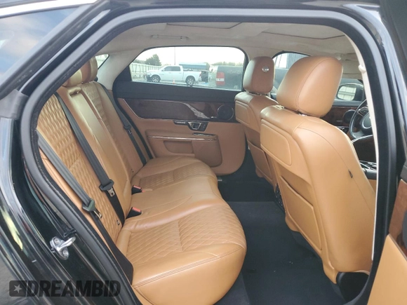 2016 Jaguar XJ Portfolio with VIN SAJWA2G71G8V95573, listed as a Copart auction lot 85975594 with 82,221 mi miles and Salvage title. Bid and sale history available at DreamBid. Image 10.