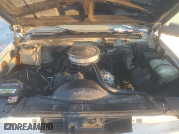 1995 GMC Sierra 1500 z VIN 2GTEK19KXS1504198, wystawiony jako Copart lot #87508215 z przebiegiem 3 210 847 mil mil oraz Szkody całkowita. Historia ofert i sprzedaży dostępna na DreamBid. Obrazek 11.