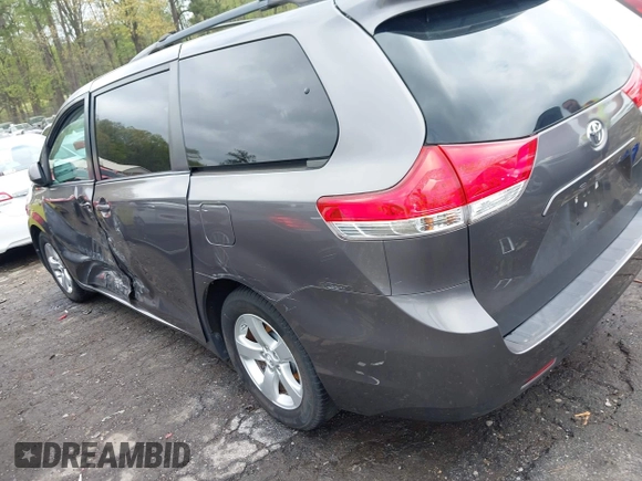 2014 Toyota Sienna LE AAS with VIN 5TDKK3DC3ES506466, listed as a IAAI auction lot 41908023 with 118,297 mi miles and . Bid and sale history available at carsss.com. Image 3.