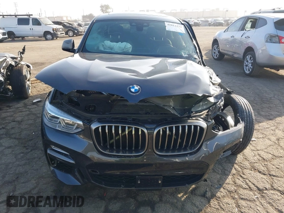 2019 BMW X4 M40i z VIN 5UXUJ5C54KLJ64077, wystawiony jako IAAI lot #41012233 z przebiegiem 40 737 mil mil oraz . Historia ofert i sprzedaży dostępna na DreamBid. Obrazek 11.