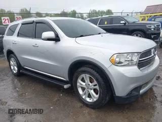 2012 Dodge Durango Crew with VIN 1C4RDJDG0CC322388, listed as a IAAI auction lot 42179814 with 124,009 mi miles. Bid and sale history available at carsss.com. Image 1.