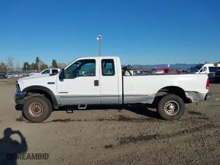 1999 Ford Super Duty F-250 XL with VIN 1FTNX21F4XED35890, listed as a IAAI auction lot 41420623 with 214,432 mi miles. Bid and sale history available at carsss.com. Image 14.