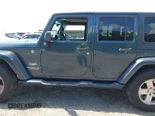 2007 Jeep Wrangler Unlimited Sahara with VIN 1J4GA59117L216687, listed as a IAAI auction lot 42188257 with 176,507 mi miles and . Bid and sale history available at DreamBid. Image 15.