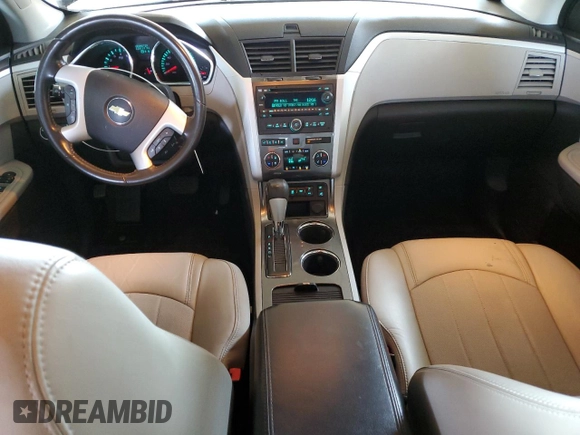 2012 Chevrolet Traverse LTZ z VIN 1GNKRLED9CJ332651, wystawiony jako Copart lot #55253655 z przebiegiem 128 113 mil mil oraz Szkoda całkowita • Salvage title. Historia ofert i sprzedaży dostępna na DreamBid. Obrazek 8.