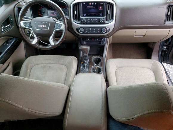 2015 GMC Canyon 2WD SLE with VIN 1GTH5BEA7F1158758, listed as a Copart auction lot 63617524 with 102,744 mi miles and Salvage Title. Bid and sale history available at carsss.com. Image 8.