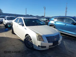 2011 Cadillac CTS Luxury z VIN 1G6DE5EY6B0118591, wystawiony jako IAAI lot #41486928 z przebiegiem 133 763 mil mil oraz . Historia ofert i sprzedaży dostępna na DreamBid. Obrazek 1.