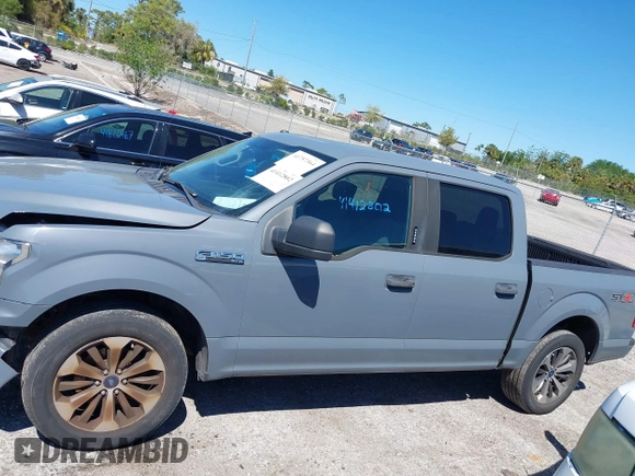 2019 Ford F-150 XL with VIN 1FTEW1CP1KFC29631, listed as a IAAI auction lot 41757364 with 81,796 mi miles and . Bid and sale history available at carsss.com. Image 14.