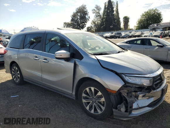 2021 Honda Odyssey EX-L with VIN 5FNRL6H77MB011099, listed as a Copart auction lot 47412535 with 148,004 mi miles and Salvage Title. Bid and sale history available at DreamBid. Image 4.