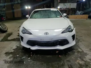 2017 Toyota 86 with VIN JF1ZNAA18H8705928, listed as a Copart auction lot 77535714 with 106,596 mi miles and Salvage Title. Bid and sale history available at carsss.com. Image 14.