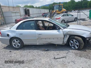 2000 Cadillac Catera z VIN W06VR54R0YR087456, wystawiony jako IAAI lot #42155135 z przebiegiem Nie podano mil oraz . Historia ofert i sprzedaży dostępna na DreamBid. Obrazek 13.