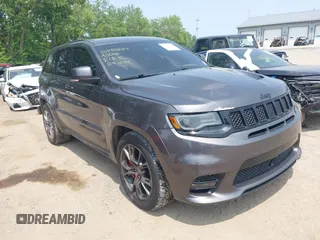 2018 Jeep Grand Cherokee SRT z VIN 1C4RJFDJ7JC281644, wystawiony jako IAAI lot #42481239 z przebiegiem 160 218 mil mil oraz . Historia ofert i sprzedaży dostępna na DreamBid. Obrazek 1.