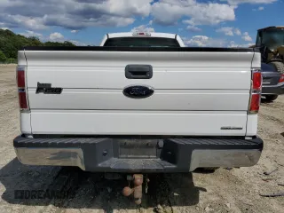 2014 Ford F-150 XL with VIN 1FTMF1CM7EKD02336, listed as a Copart auction lot 57333815 with 126,053 mi miles and Salvage title. Bid and sale history available at DreamBid. Image 6.