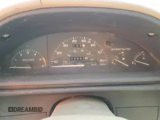 1989 Ford Tempo z VIN 1FAPP31X0KK113919, wystawiony jako Copart lot #76599314 z przebiegiem 65 823 mil mil oraz Tytuł czysty. Historia ofert i sprzedaży dostępna na DreamBid. Obrazek 9.