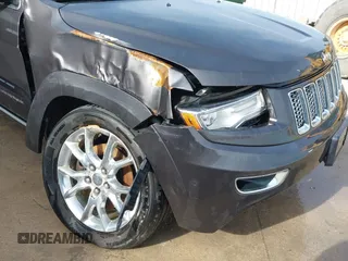 2015 Jeep Grand Cherokee Summit with VIN 1C4RJFJT1FC726330, listed as a IAAI auction lot 41781127 with 138,425 mi miles. Bid and sale history available at carsss.com. Image 6.